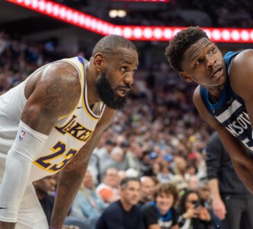 Minnesota Timberwolves guard Anthony Edwards defends Los Angeles Lakers forward LeBron James in the second quarter of Game 4 of the 2025 NBA Playoffs first round at Target Center.