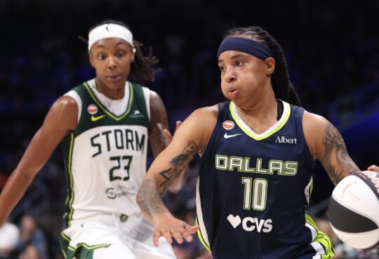 Aziaha James of the Dallas Wings controls the ball in front of Jordan Horston of the Seattle Storm during the fourth quarter at College Park Center.