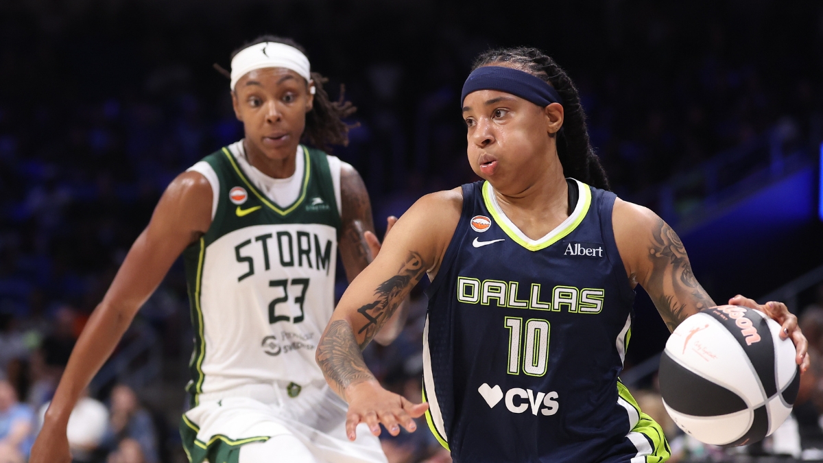 Aziaha James of the Dallas Wings controls the ball in front of Jordan Horston of the Seattle Storm during the fourth quarter at College Park Center.