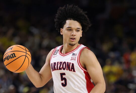 Arizona Wildcats guard Brayden Burries dribbles up the court against Michigan in the 2026 NCAA Final Four.