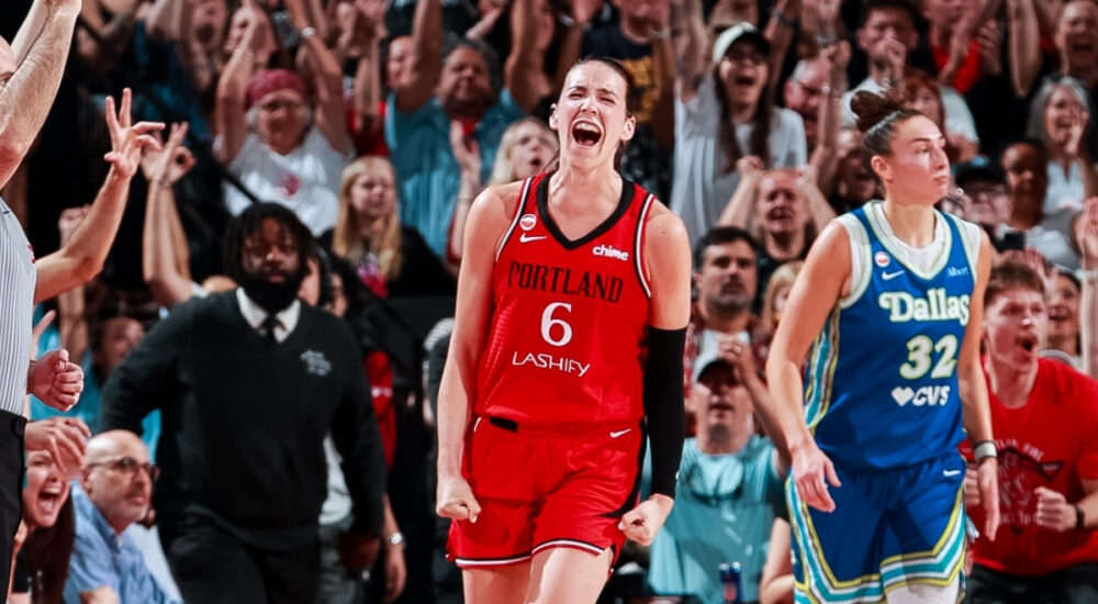 Portland Fire forward Bridget Carleton celebrates a 3-pointer as Dallas Wings center Jessica Shepard looks on at Moda Center on June 13, 2026.