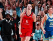 Portland Fire forward Bridget Carleton celebrates a 3-pointer as Dallas Wings center Jessica Shepard looks on at Moda Center on June 13, 2026.