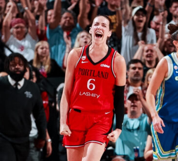 Portland Fire forward Bridget Carleton celebrates a 3-pointer as Dallas Wings center Jessica Shepard looks on at Moda Center on June 13, 2026.