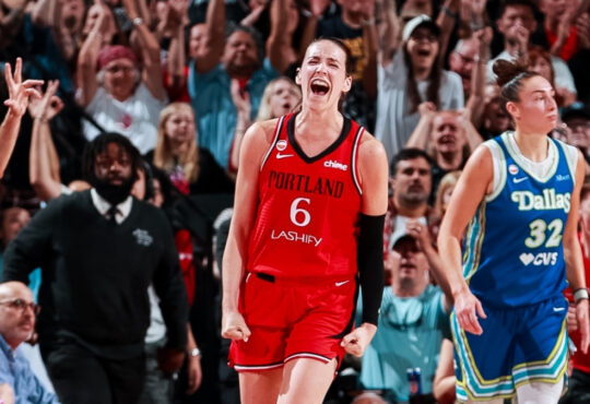 Portland Fire forward Bridget Carleton celebrates a 3-pointer as Dallas Wings center Jessica Shepard looks on at Moda Center on June 13, 2026.