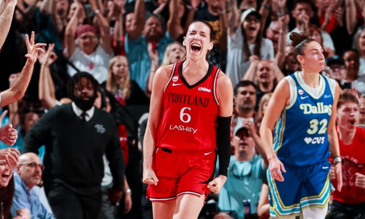 Portland Fire forward Bridget Carleton celebrates a 3-pointer as Dallas Wings center Jessica Shepard looks on at Moda Center on June 13, 2026.