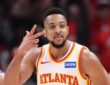 Atlanta Hawks guard CJ McCollum gestures during a game