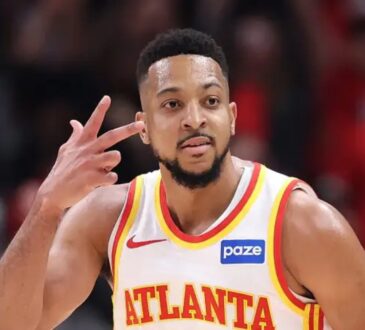 Atlanta Hawks guard CJ McCollum gestures during a game