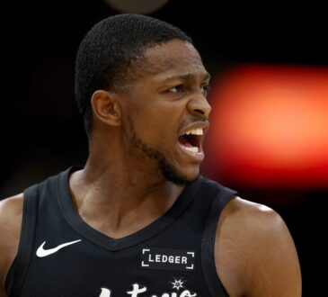 San Antonio Spurs guard De'Aaron Fox reacts during a 2025-26 game