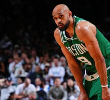 Derrick White #9 of the Boston Celtics looks on during Game 7 of the Eastern Conference First Round NBA Playoffs against the Philadelphia 76ers at TD Garden.
