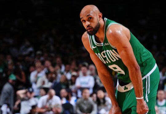 Derrick White #9 of the Boston Celtics looks on during Game 7 of the Eastern Conference First Round NBA Playoffs against the Philadelphia 76ers at TD Garden.