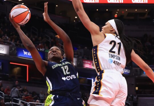 Dallas Wings' Dulcy Fankam Mendjiadeu goes up for a shot against Indiana Fever's Makayla Timpson during a preseason game at Gainbridge Fieldhouse on April 30, 2026, in Indianapolis, Indiana.