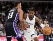 Ja Morant, a Kings trade target, drives to the basket against Sacramento's Keegan Murray