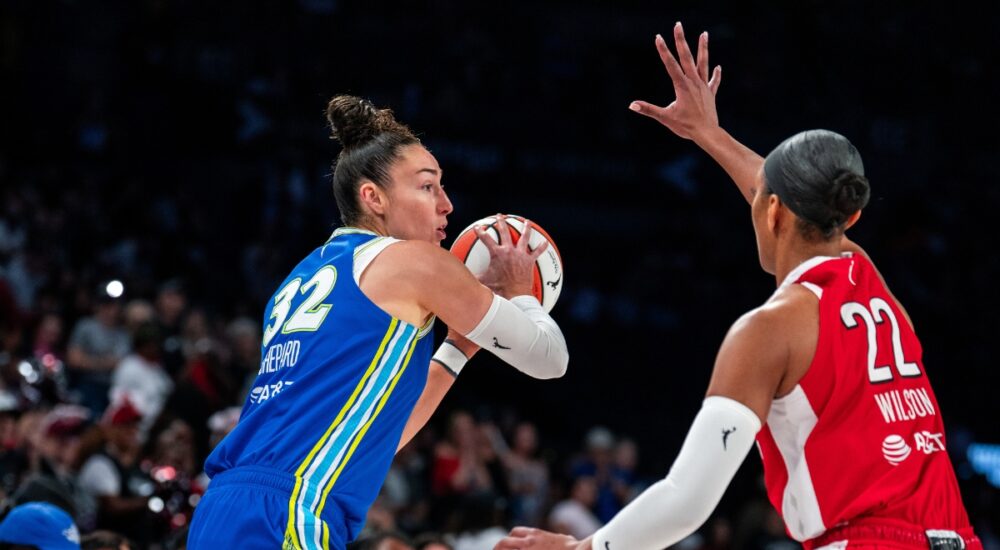 Jessica Shepard surveys the floor against A'ja Wilson during the Dallas Wings' game at the Las Vegas Aces on June 25, 2026.