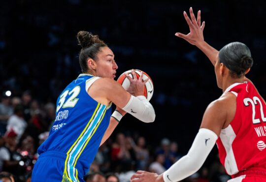 Jessica Shepard surveys the floor against A'ja Wilson during the Dallas Wings' game at the Las Vegas Aces on June 25, 2026.