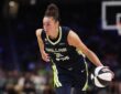 Jessica Shepard of the Dallas Wings controls the ball against the Seattle Storm at College Park Center.