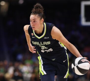 Jessica Shepard of the Dallas Wings controls the ball against the Seattle Storm at College Park Center.