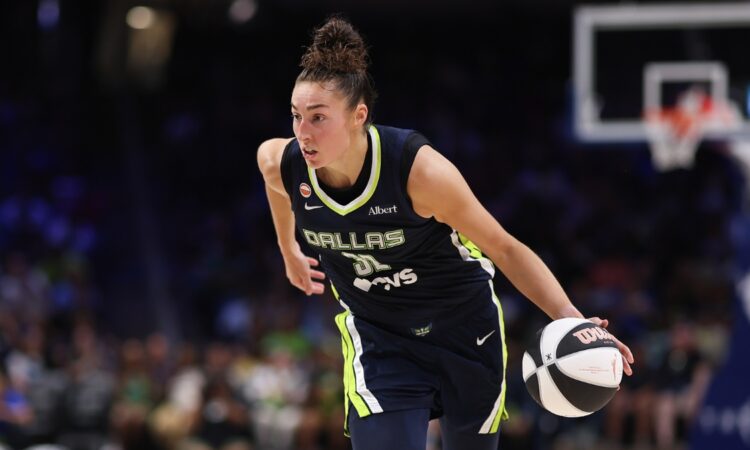 Jessica Shepard of the Dallas Wings controls the ball against the Seattle Storm at College Park Center.