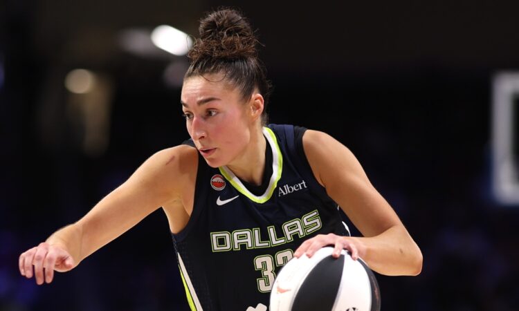 Jessica Shepard of the Dallas Wings controls the ball during the third quarter against the Seattle Storm at College Park Center.