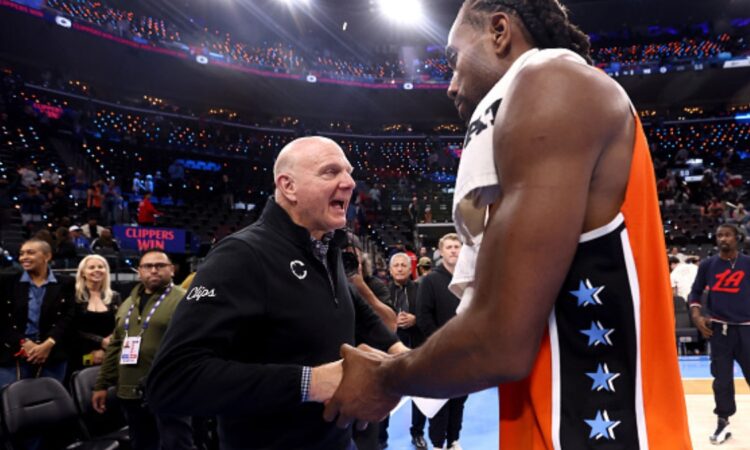 Owner Steve Ballmer of the LA Clippers congratulates Kawhi Leonard #2 after his 55-point performance against the Detroit Pistons at Intuit Dome.