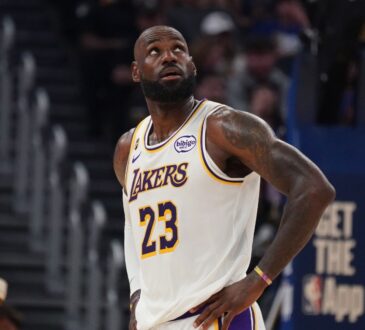 Los Angeles Lakers forward LeBron James waits for play to resume against the Golden State Warriors in the second quarter at Chase Center.