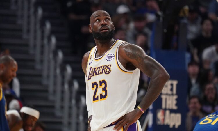 Los Angeles Lakers forward LeBron James waits for play to resume against the Golden State Warriors in the second quarter at Chase Center.