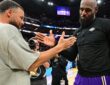 LeBron James #23 of the Los Angeles Lakers and Stephen Curry #30 of the Golden State Warriors high five after a game at Chase Center.
