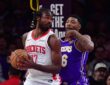 Houston Rockets forward Kevin Durant controls the ball against Los Angeles Lakers guard Marcus Smart during a 2026 NBA Playoffs game at Crypto.com Arena