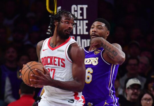 Houston Rockets forward Kevin Durant controls the ball against Los Angeles Lakers guard Marcus Smart during a 2026 NBA Playoffs game at Crypto.com Arena