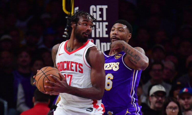 Houston Rockets forward Kevin Durant controls the ball against Los Angeles Lakers guard Marcus Smart during a 2026 NBA Playoffs game at Crypto.com Arena