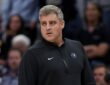 Minnesota Timberwolves assistant coach Micah Nori watching from the sideline during a 2024 playoff game against the Denver Nuggets