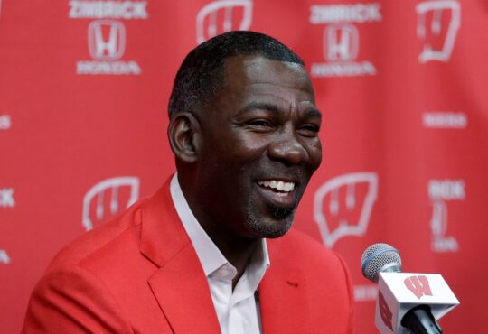 Former Dallas Mavericks executive Michael Finley speaks to the media at the Kohl Center in Madison, Wisconsin.