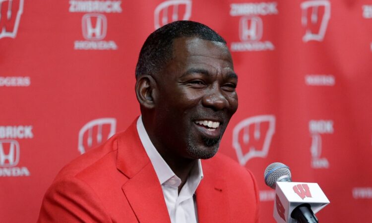 Former Dallas Mavericks executive Michael Finley speaks to the media at the Kohl Center in Madison, Wisconsin.