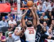 New York Knicks center Mitchell Robinson goes up to dunk against Dallas Mavericks center Daniel Gafford at American Airlines Center.
