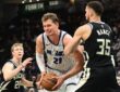 Orlando Magic center Moe Wagner controls the ball against Milwaukee Bucks forward Pete Nance in the fourth quarter at Fiserv Forum on March 8, 2026.