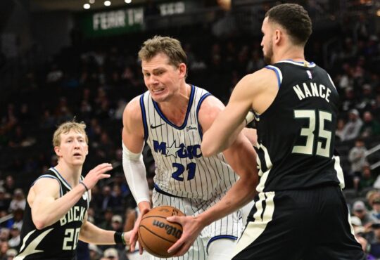 Orlando Magic center Moe Wagner controls the ball against Milwaukee Bucks forward Pete Nance in the fourth quarter at Fiserv Forum on March 8, 2026.