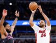Miami Heat guard Norman Powell shoots against Chicago Bulls guard Coby White during the second half at United Center