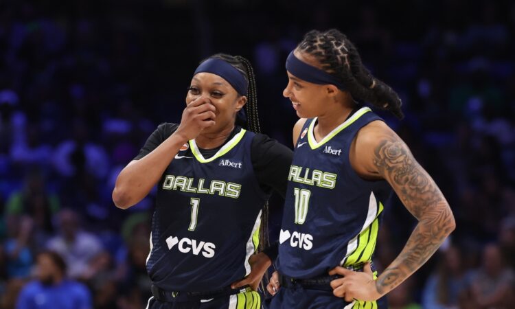 Dallas Wings guards Odyssey Sims and Aziaha James talk during a June 1, 2026 game against the Seattle Storm at College Park Center.