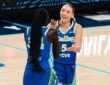 Dallas Wings guard Paige Bueckers celebrates with forward Awak Kuier during a WNBA game against the Las Vegas Aces at College Park Center in Arlington, Texas, on June 15, 2026.
