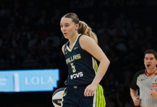 Dallas Wings guard Paige Bueckers dribbles the ball during a road game against the Minnesota Lynx