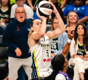 Paige Bueckers rises for a jump shot over Phoenix Mercury defender Monique Akoa Makani during the Dallas Wings' 85-70 win at College Park Center on June 11, 2026.