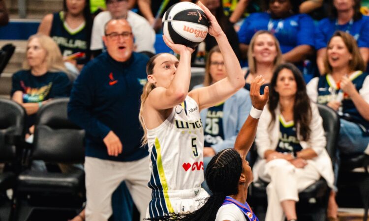 Paige Bueckers rises for a jump shot over Phoenix Mercury defender Monique Akoa Makani during the Dallas Wings' 85-70 win at College Park Center on June 11, 2026.
