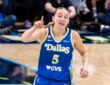 Paige Bueckers gestures in a blue Dallas Wings uniform near teammate Jessica Shepard during a game against the Atlanta Dream on May 12, 2026
