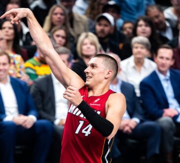 Miami Heat guard Tyler Herro holds his follow-through after a shot during a road game in Dallas during the 2025-26 season