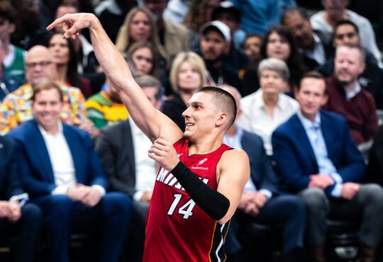 Miami Heat guard Tyler Herro holds his follow-through after a shot during a road game in Dallas during the 2025-26 season