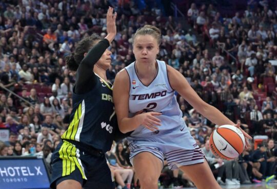 Dallas Wings forward Alysha Clark defends Toronto Tempo forward Laura Juškaitė during the second half at Bell Centre.