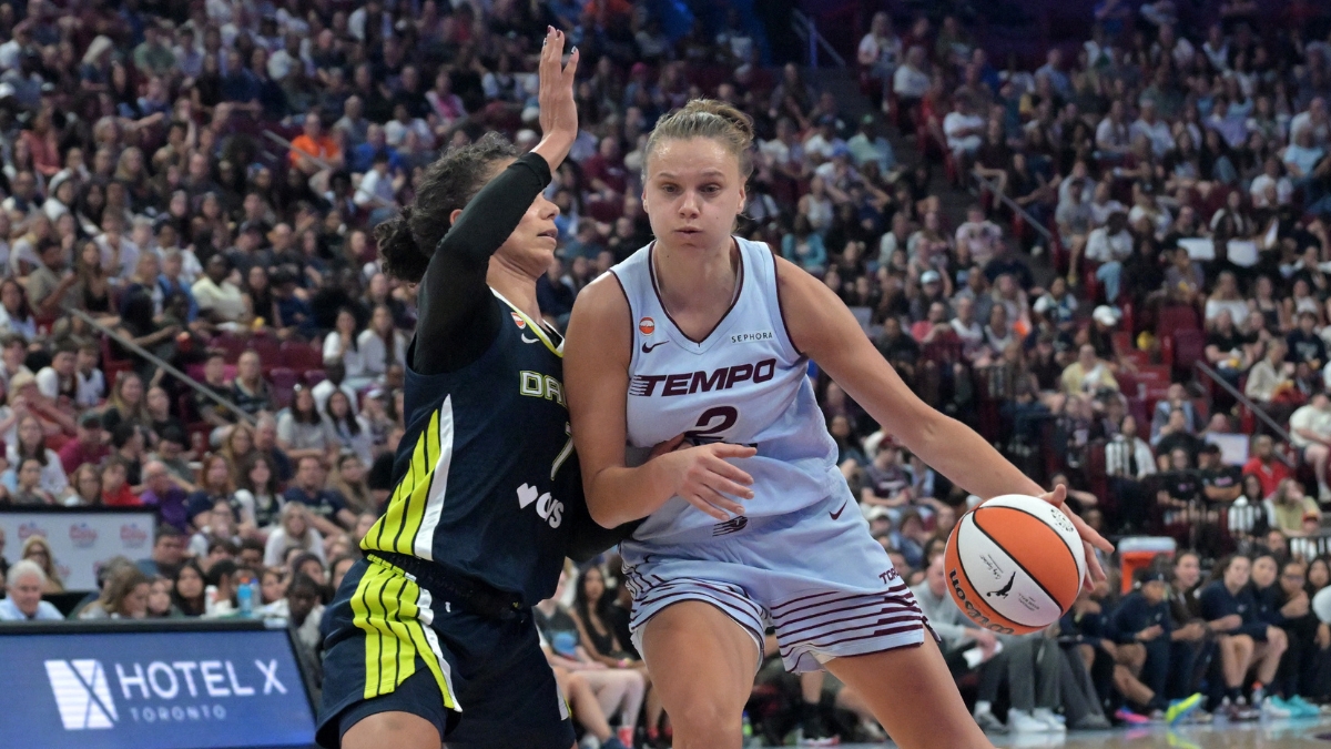 Dallas Wings forward Alysha Clark defends Toronto Tempo forward Laura Juškaitė during the second half at Bell Centre.