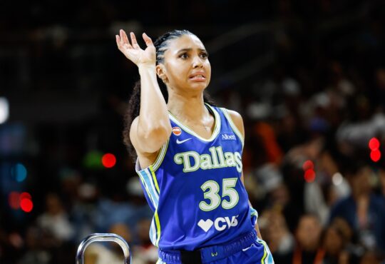 Dallas Wings guard Azzi Fudd follows through on a 3-pointer during the 2026 WNBA 3-Point Contest at Wintrust Arena in Chicago.