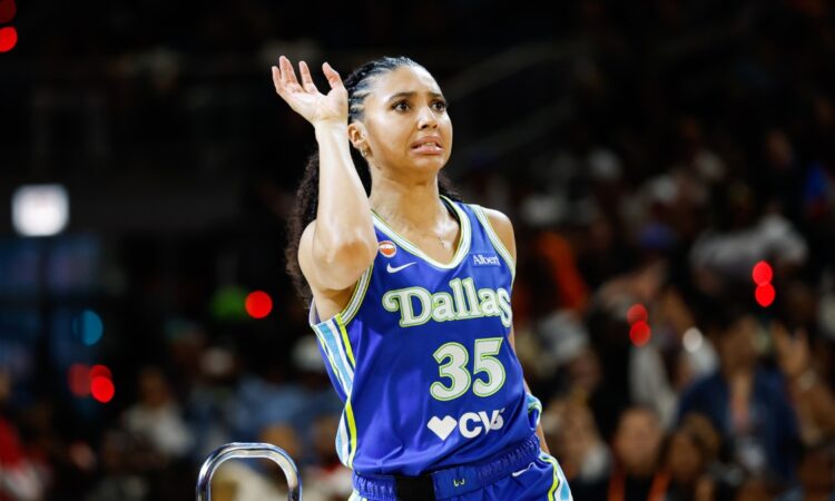 Dallas Wings guard Azzi Fudd follows through on a 3-pointer during the 2026 WNBA 3-Point Contest at Wintrust Arena in Chicago.