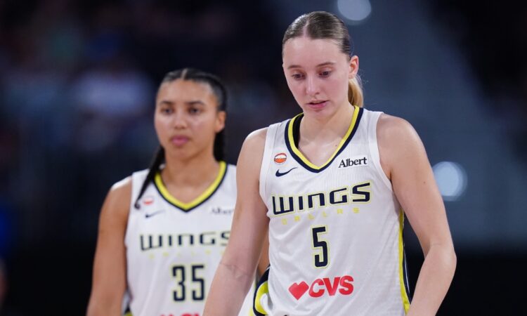 Dallas Wings guards Paige Bueckers and Azzi Fudd on the court against the Connecticut Sun in the second half at PeoplesBank Arena