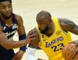 Cleveland Cavaliers guard Donovan Mitchell #45 defends Los Angeles Lakers forward LeBron James #23 during the fourth quarter at Rocket Arena.